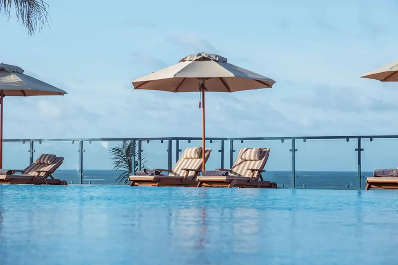 Infinity pool edge overlooking the Indian Ocean at Aya Sophia